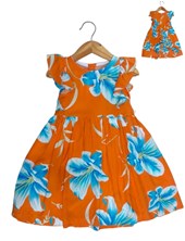 vestido de niña fibrana estampado flores con volados fondo naranja tyg