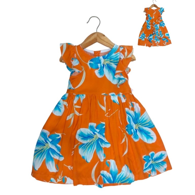 vestido de niña fibrana estampado flores con volados fondo naranja tyg