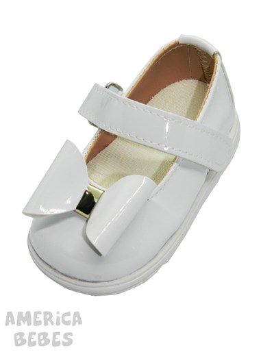 A314 BLANCO GUILLERMINA PARA BEBA EN CHAROL CON MOÑO Y ABROJO PEPES BEBES