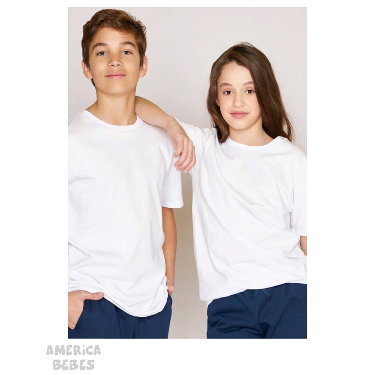 Remera pique M/C blanca colegial. ely