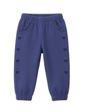 Jean beba nena babucha con moñitos bordados.Gepetto