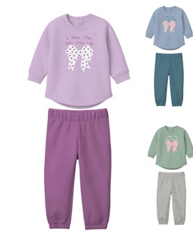 Conjunto beba nena con moño corazones y brillo.Gepetto