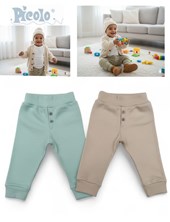 Pantalon con puño y cintura.Piccolo