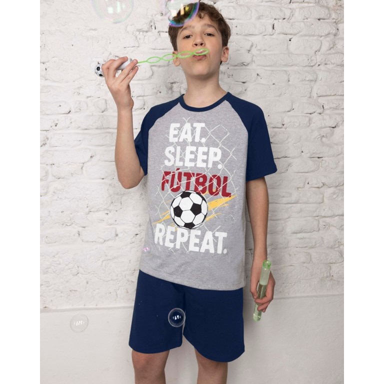 Pijama de varon en  jersey con estampa de futbol que brilla en la oscuridad.