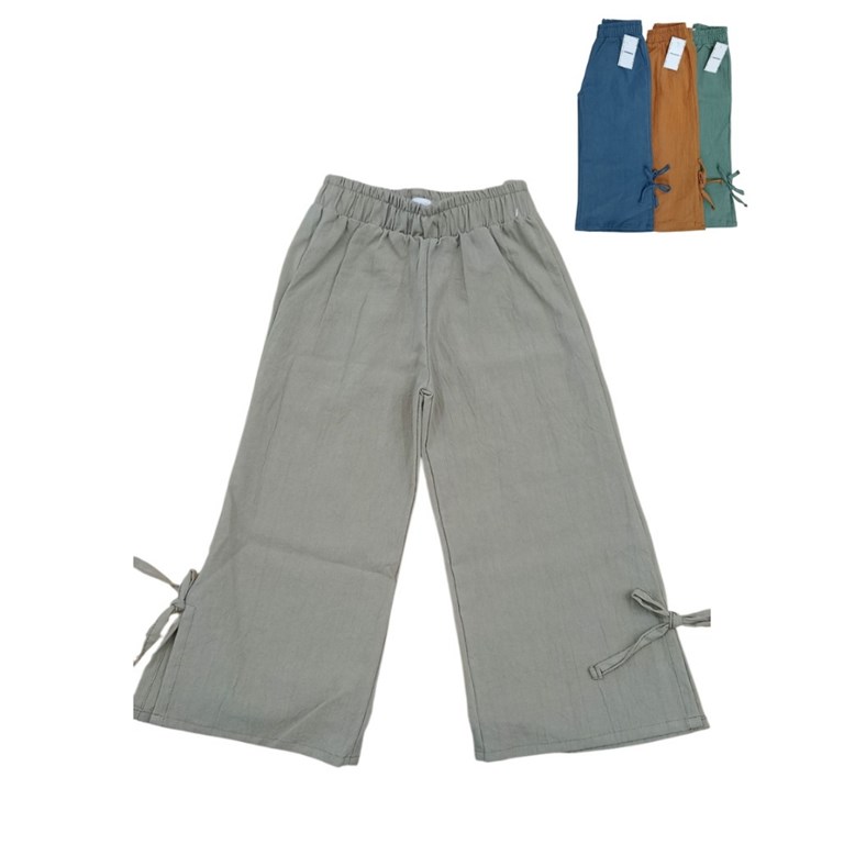 Pantalon de nena en tussor con tajo y moño.Poninos