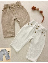 Pantalon Facu de lino con bones en cintura y broches en piernas. COCOMIEL