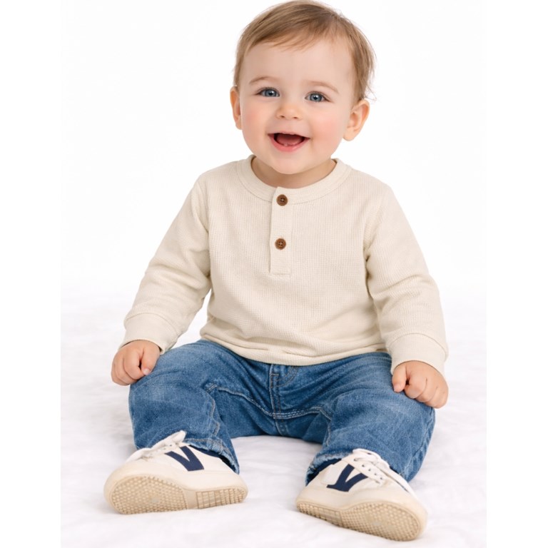 Remera bebe manga larga con boton.Naranjo