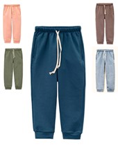 Pantalon frisa con bolsillos.Naranjo