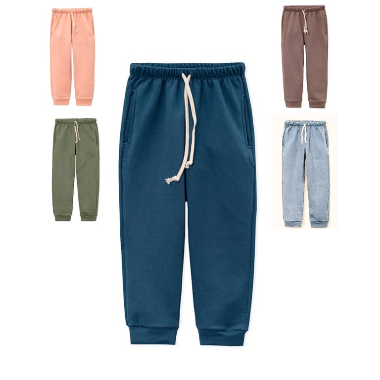 Pantalon frisa con bolsillos.Naranjo