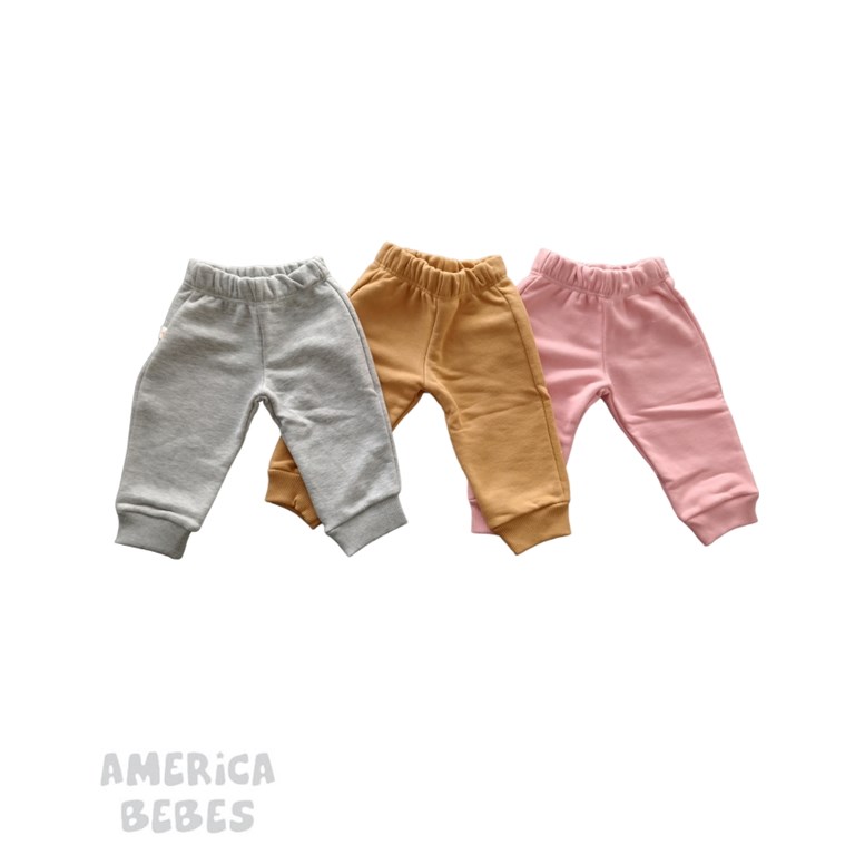 Pantalón rustico bebe mini. Naranjo