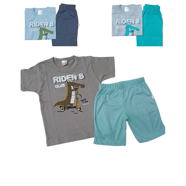 Pijama nene remera con estampada y short liso. Naranjo