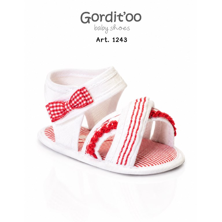 SANDALIA CRUZADA BLANCA VOLADO-MOÑO CUADRILLE  ROJO PARA BEBA. GORDITOO