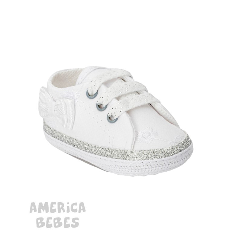 ZAPATILLA BBA BRODERIE BLANCO CON MOÑO Y CORAZON EN PLATA GORDITOO